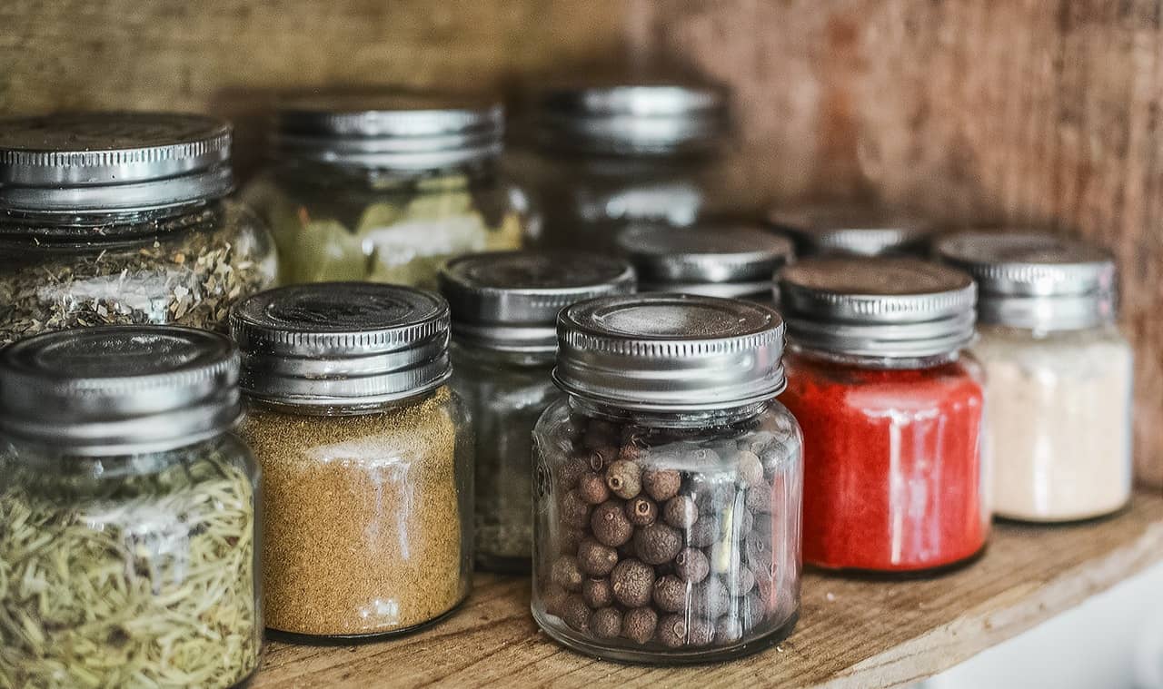 assorted jars of canned food and spices