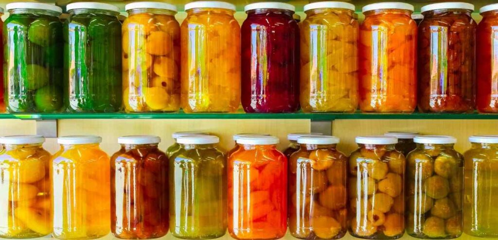 Several jars of canned fruit